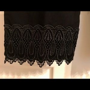 Beautiful wide lace trim on these black crops